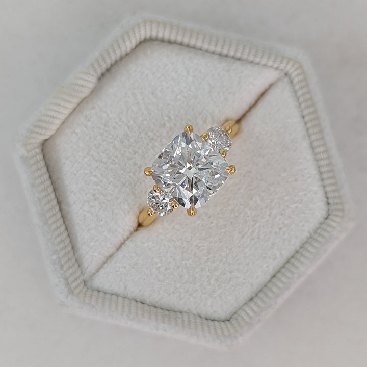 Cushion cut engagement ring side view showing band detail