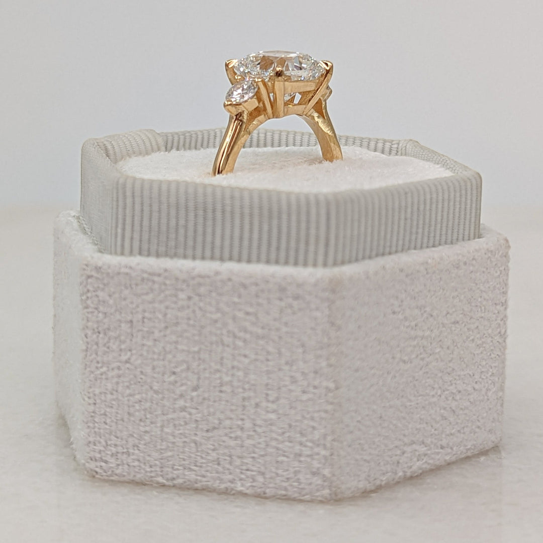 Side angle of cushion solitaire diamond engagement ring