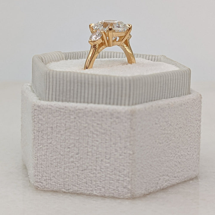 Side angle of cushion solitaire diamond engagement ring