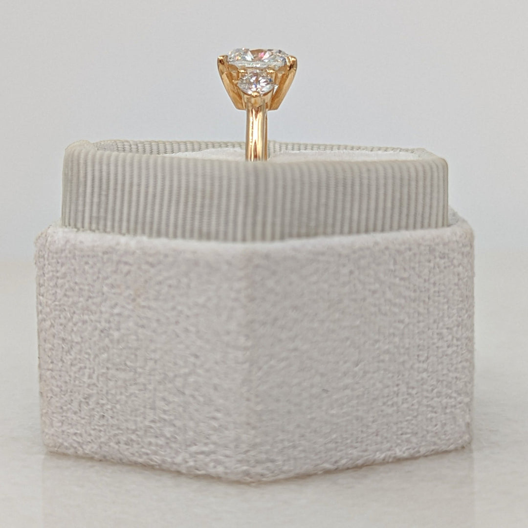 Profile view of cushion cut solitaire engagement ring band