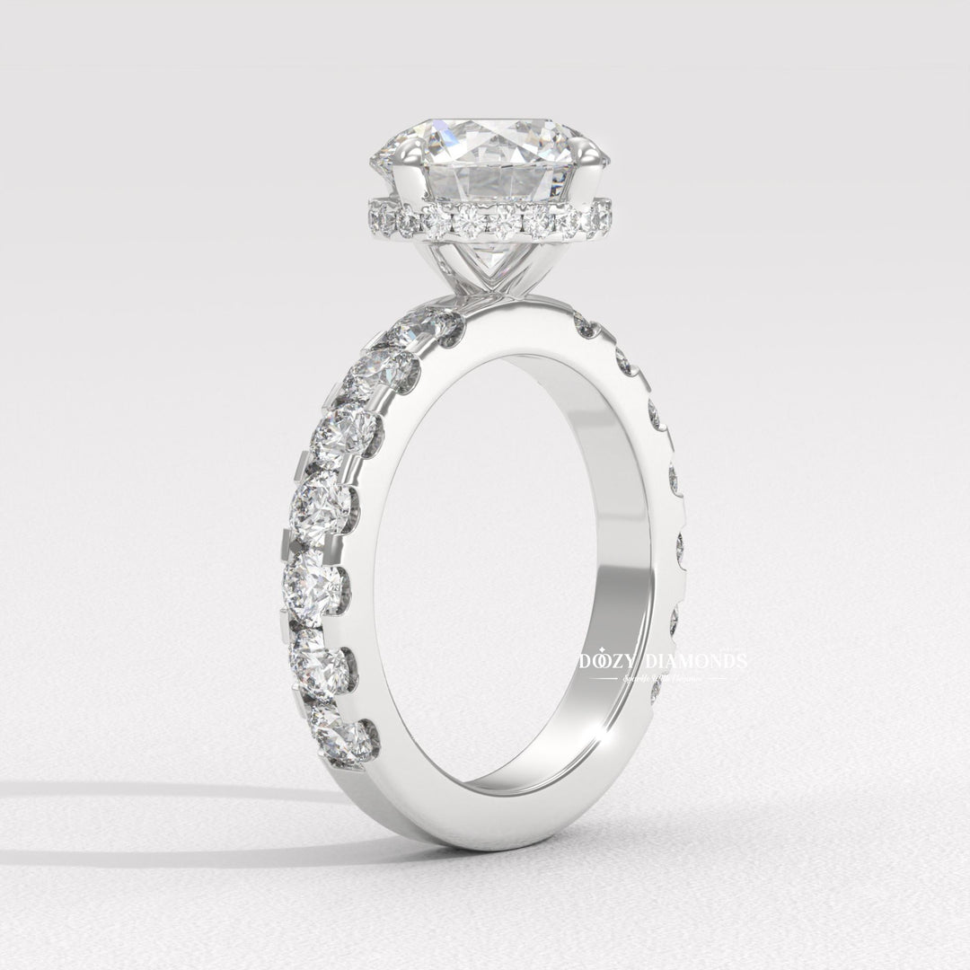 Round cut diamond ring worn on hand