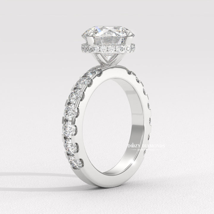 Round cut diamond ring worn on hand
