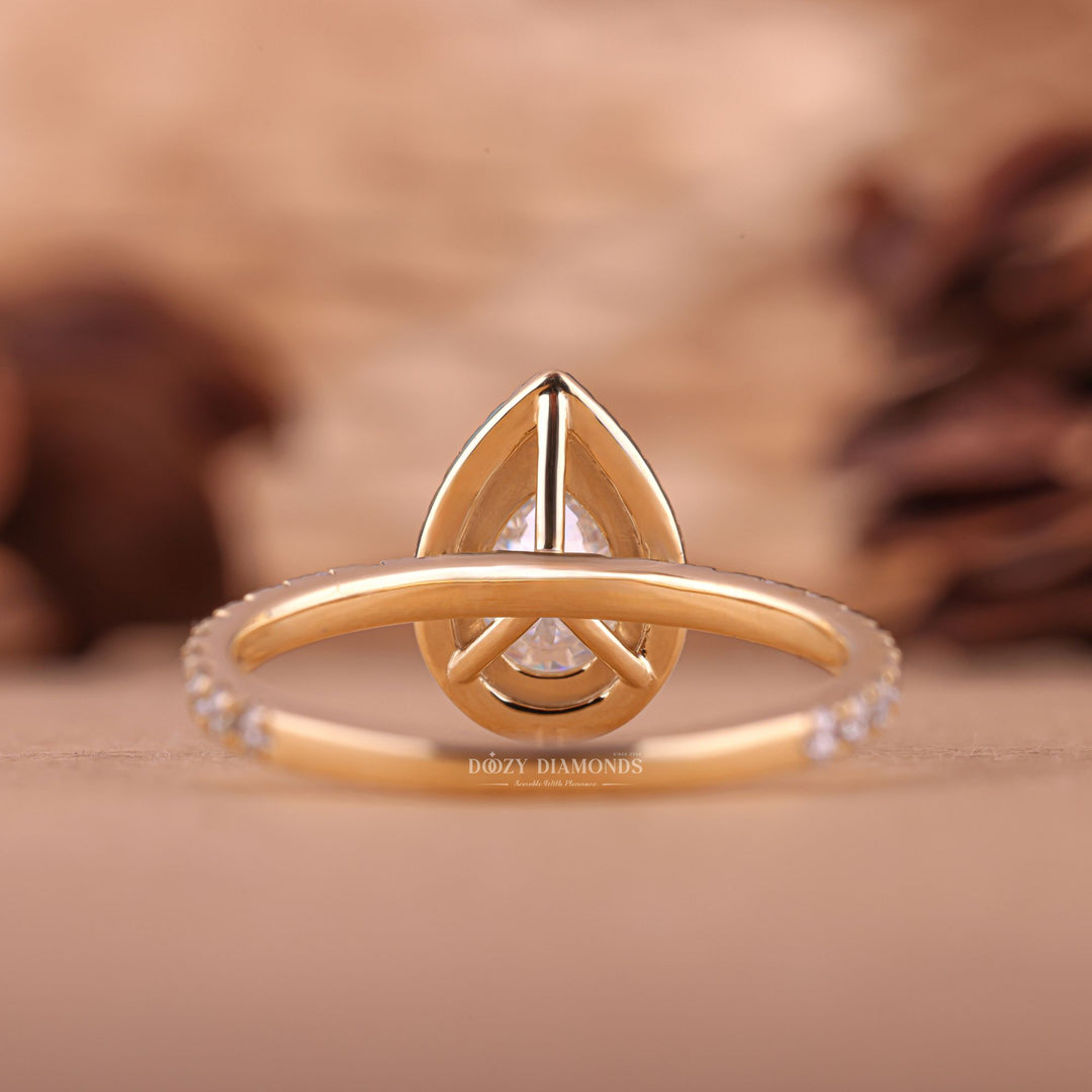 Classic pear halo engagement ring crafted for everyday wear