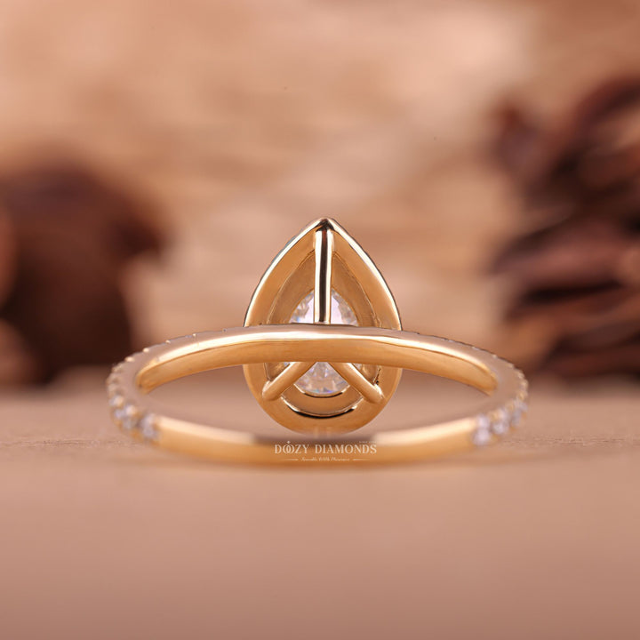 Classic pear halo engagement ring crafted for everyday wear