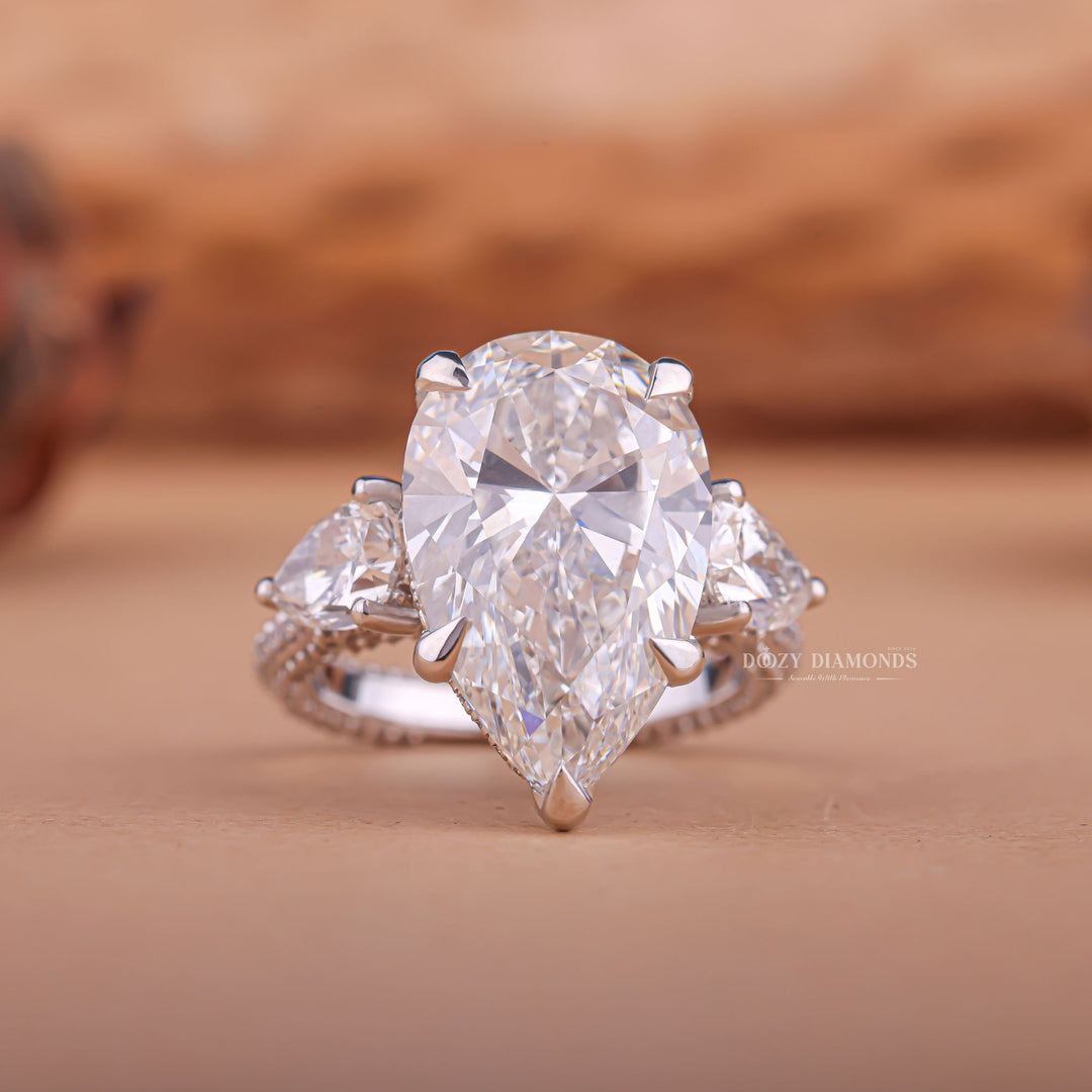 Shop pear three stone lab grown diamond engagement ring