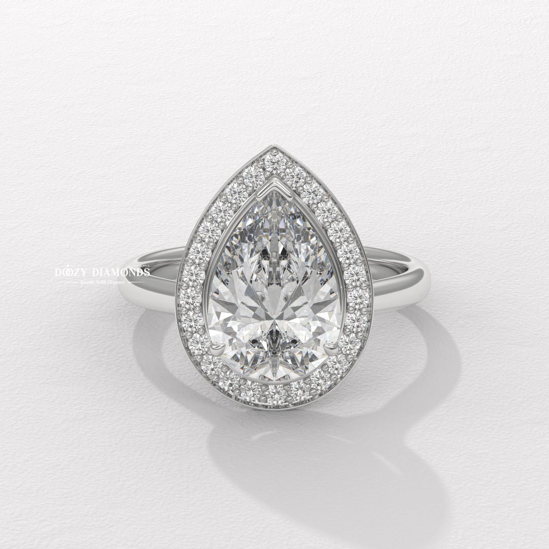 Fine craftsmanship detail on pear halo engagement ring