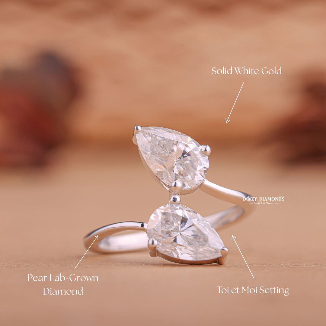 Pear cut solitaire engagement ring shown in real-life wear