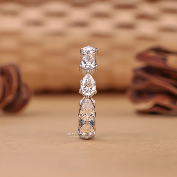 Eternity pear diamond wedding band front view