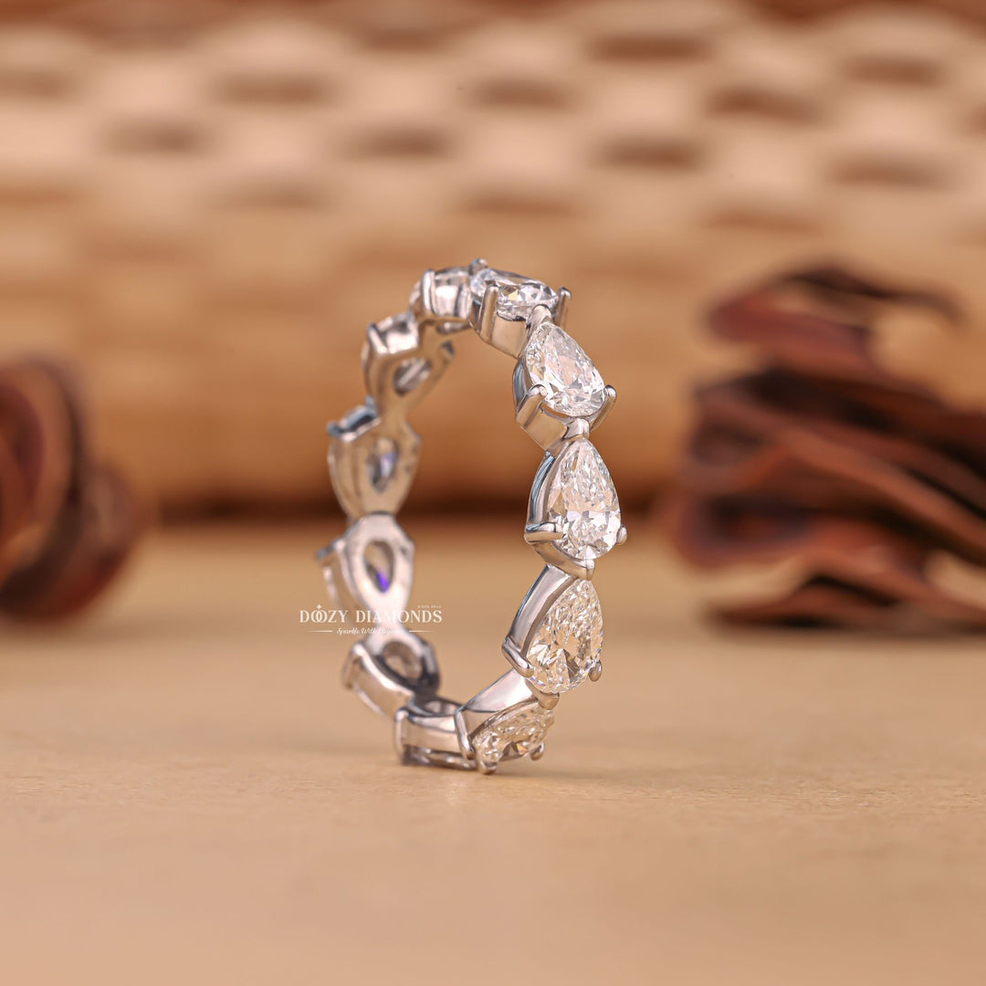 Eternity diamond band stacked with engagement ring