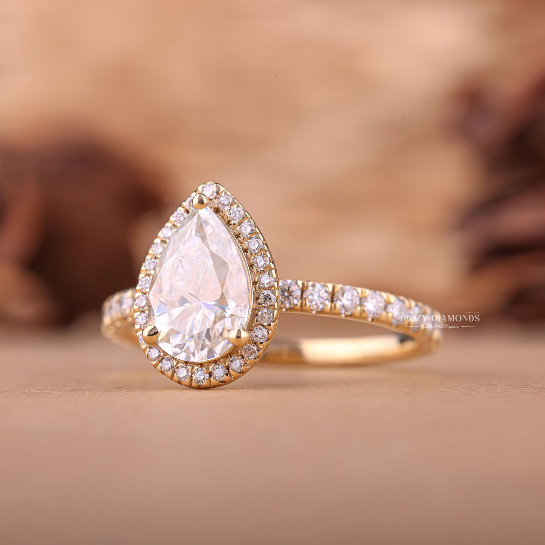 Handcrafted pear cut halo lab grown diamond engagement ring