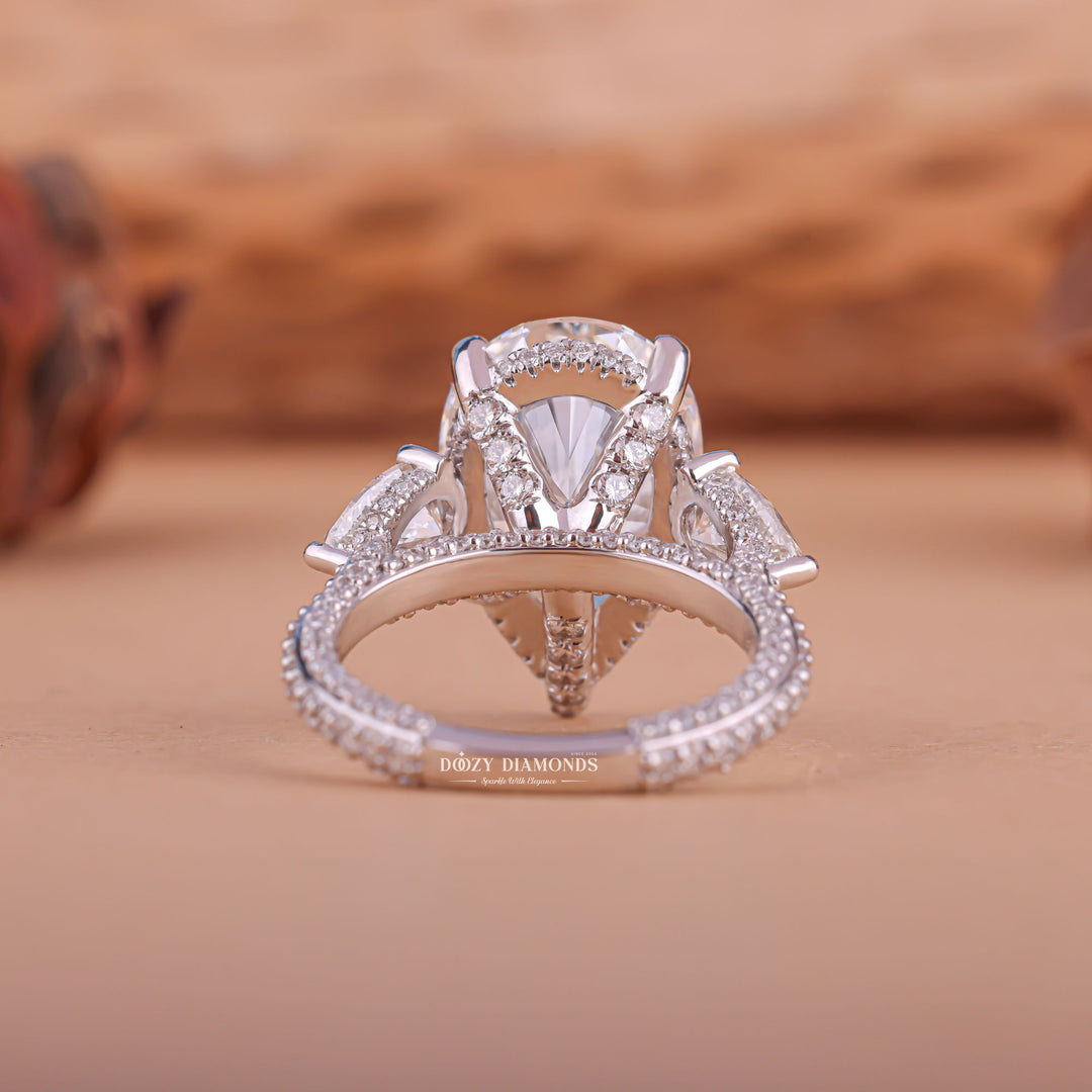 Classic pear three stone engagement ring crafted for everyday wear