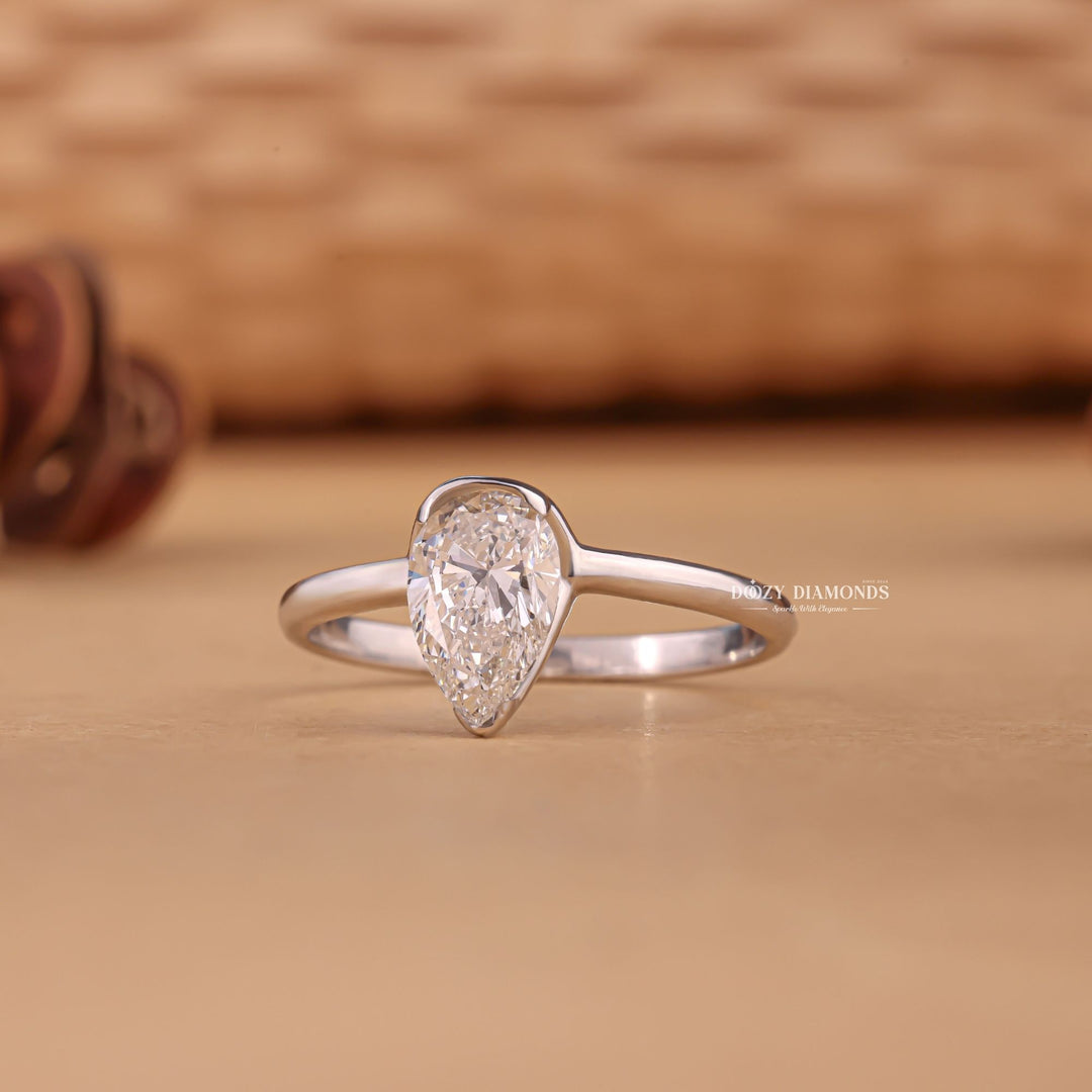 Shop the pear cut solitaire engagement ring collection online