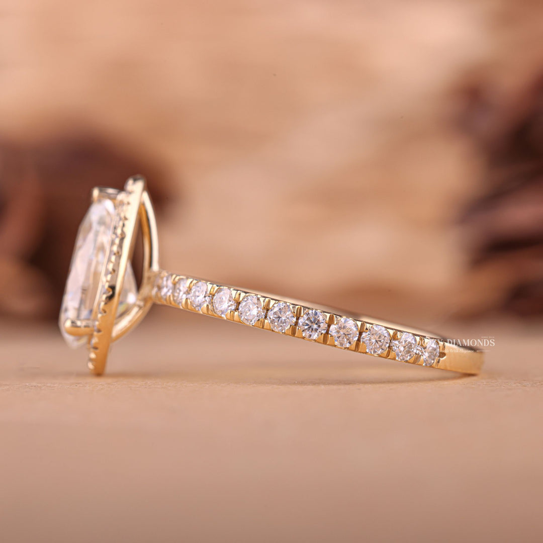 Premium pear cut halo engagement ring crafted in solid gold