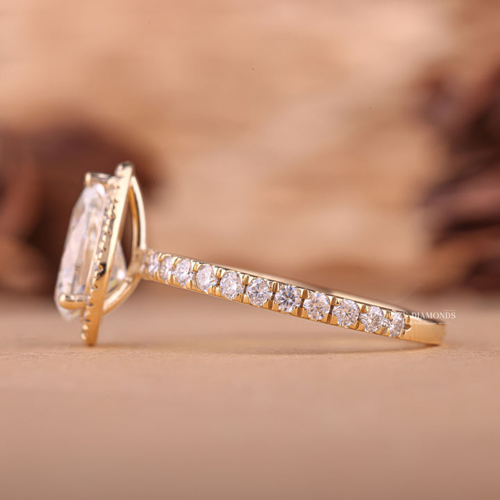 Premium pear cut halo engagement ring crafted in solid gold