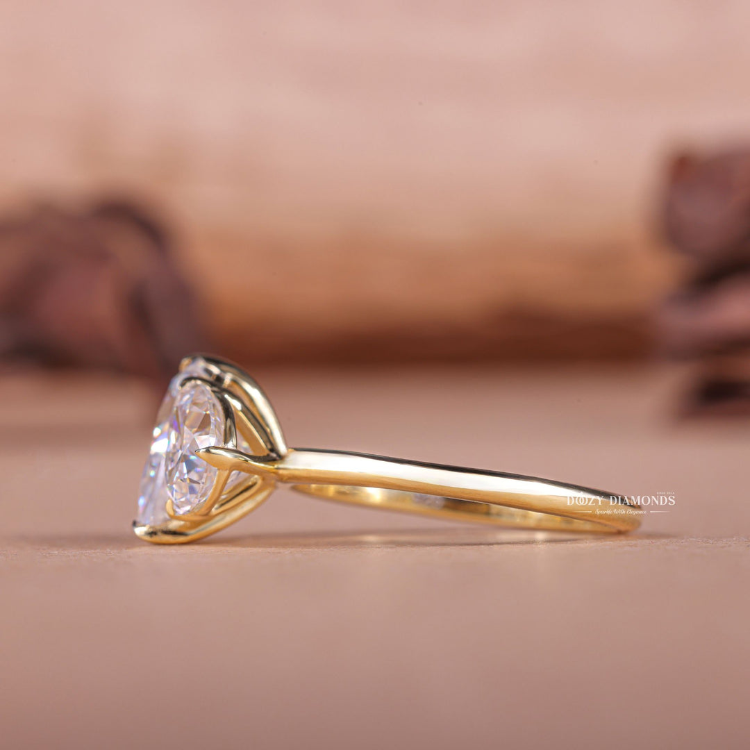 Pear solitaire engagement ring with IGI certificate and packaging