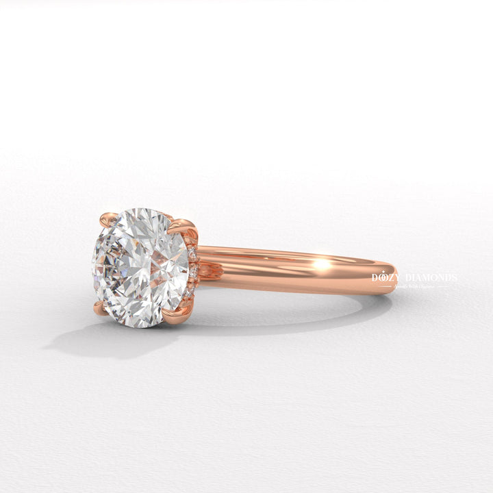 Round hidden halo diamond ring displayed on jewelry stand