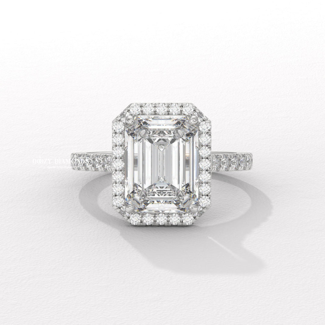 Emerald pave engagement ring offered in gold and platinum
