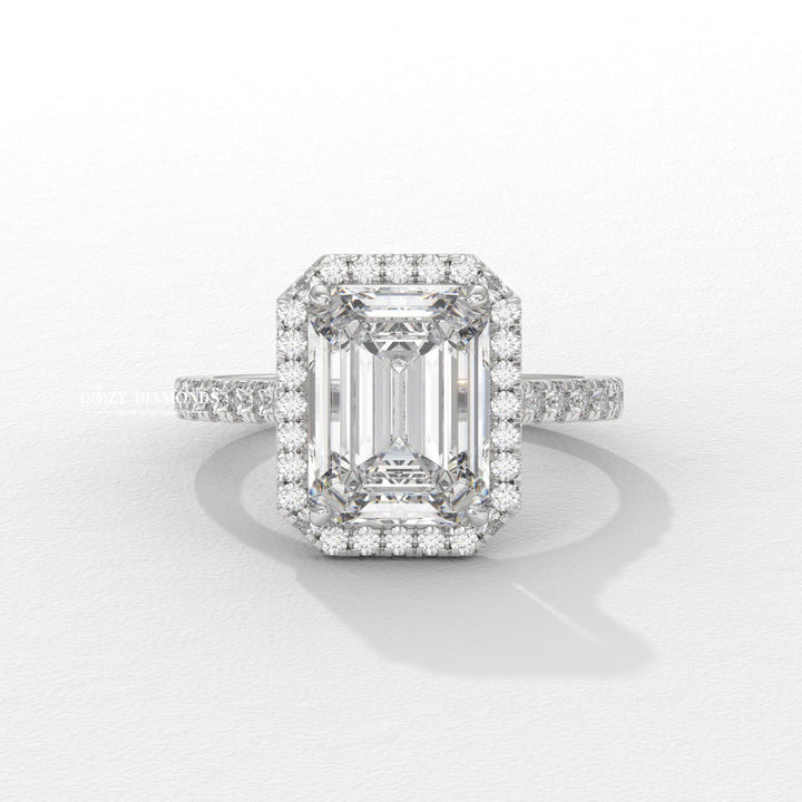 Emerald pave engagement ring offered in gold and platinum
