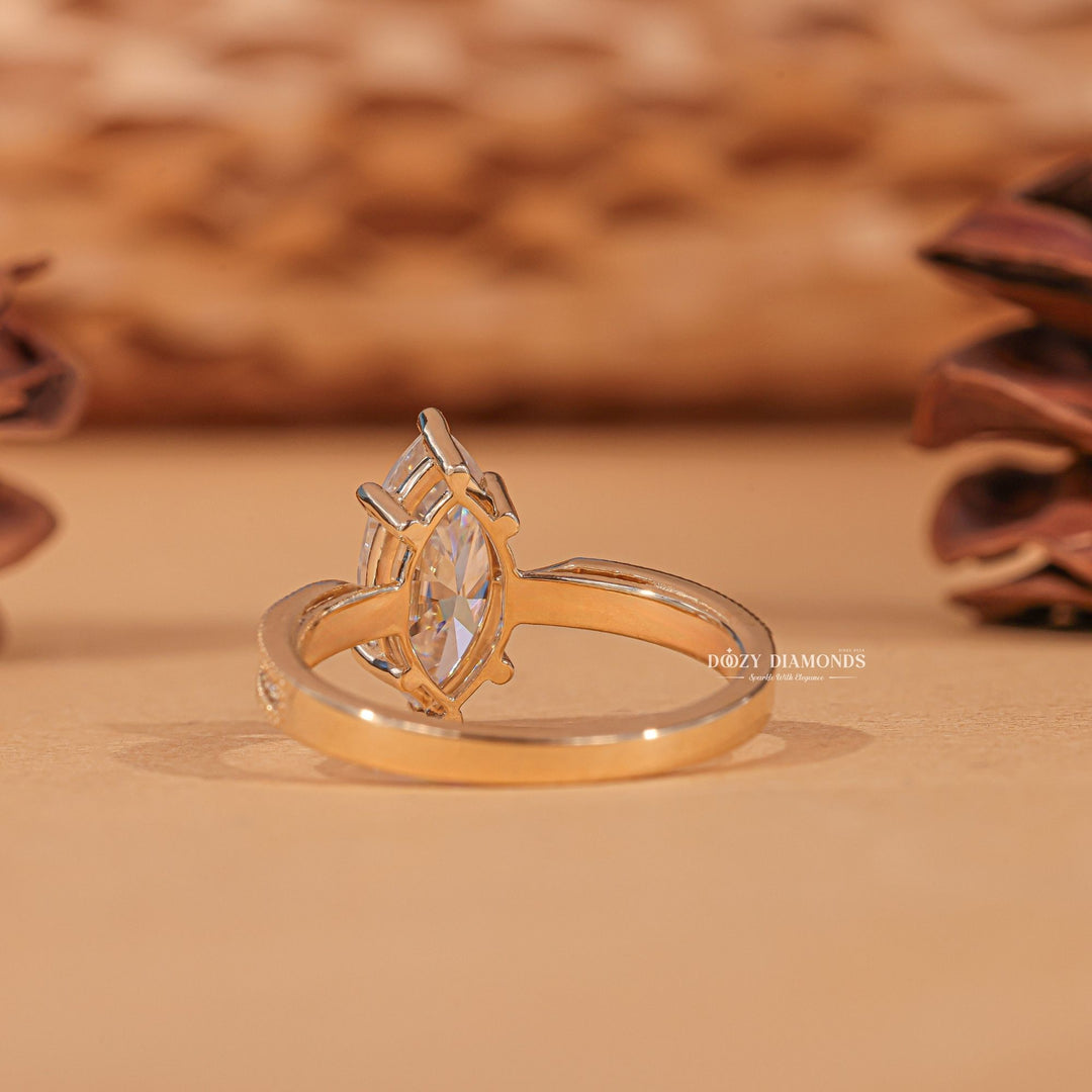 Marquise milgrain ring set with an IGI graded diamond
