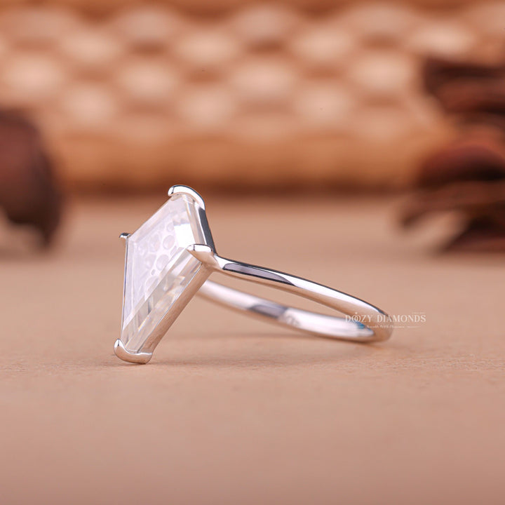 IGI certified kite cut diamond in art deco engagement ring setting
