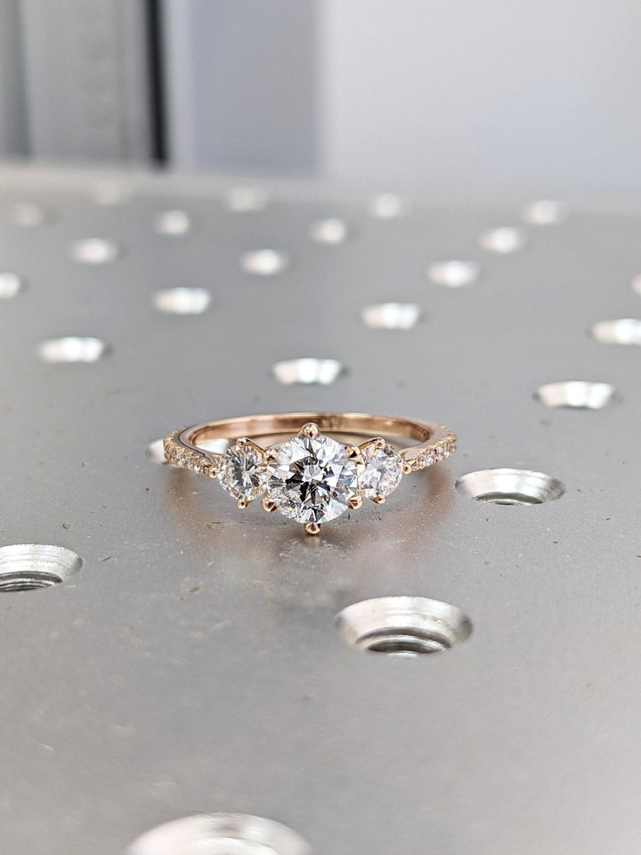 Round solitaire lab grown diamond ring side profile in gold setting