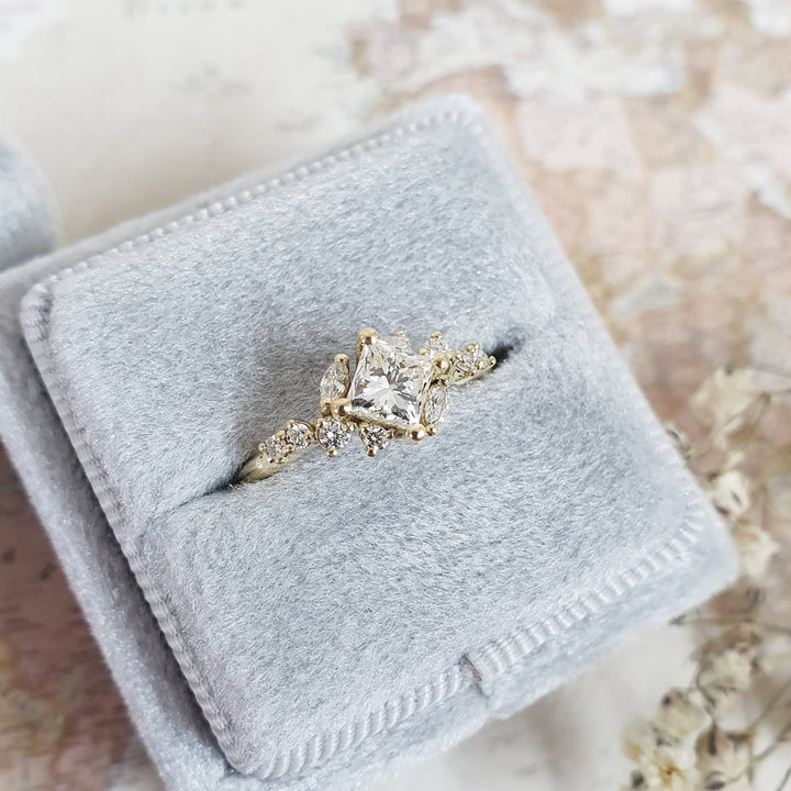 Princess cut diamond ring worn on hand