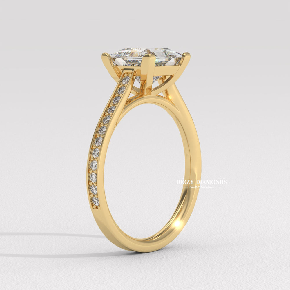 Princess solitaire diamond ring displayed on jewelry stand
