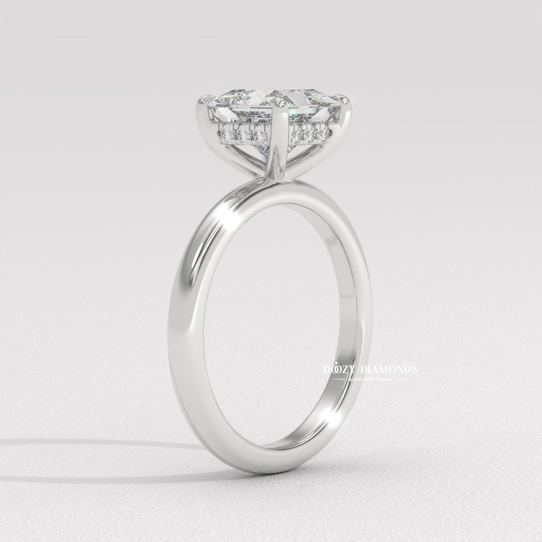 Princess solitaire ring set with an IGI graded diamond