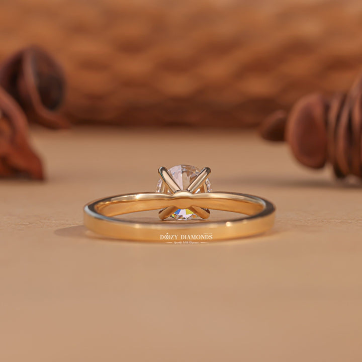 Round solitaire lab grown diamond ring side profile in gold setting