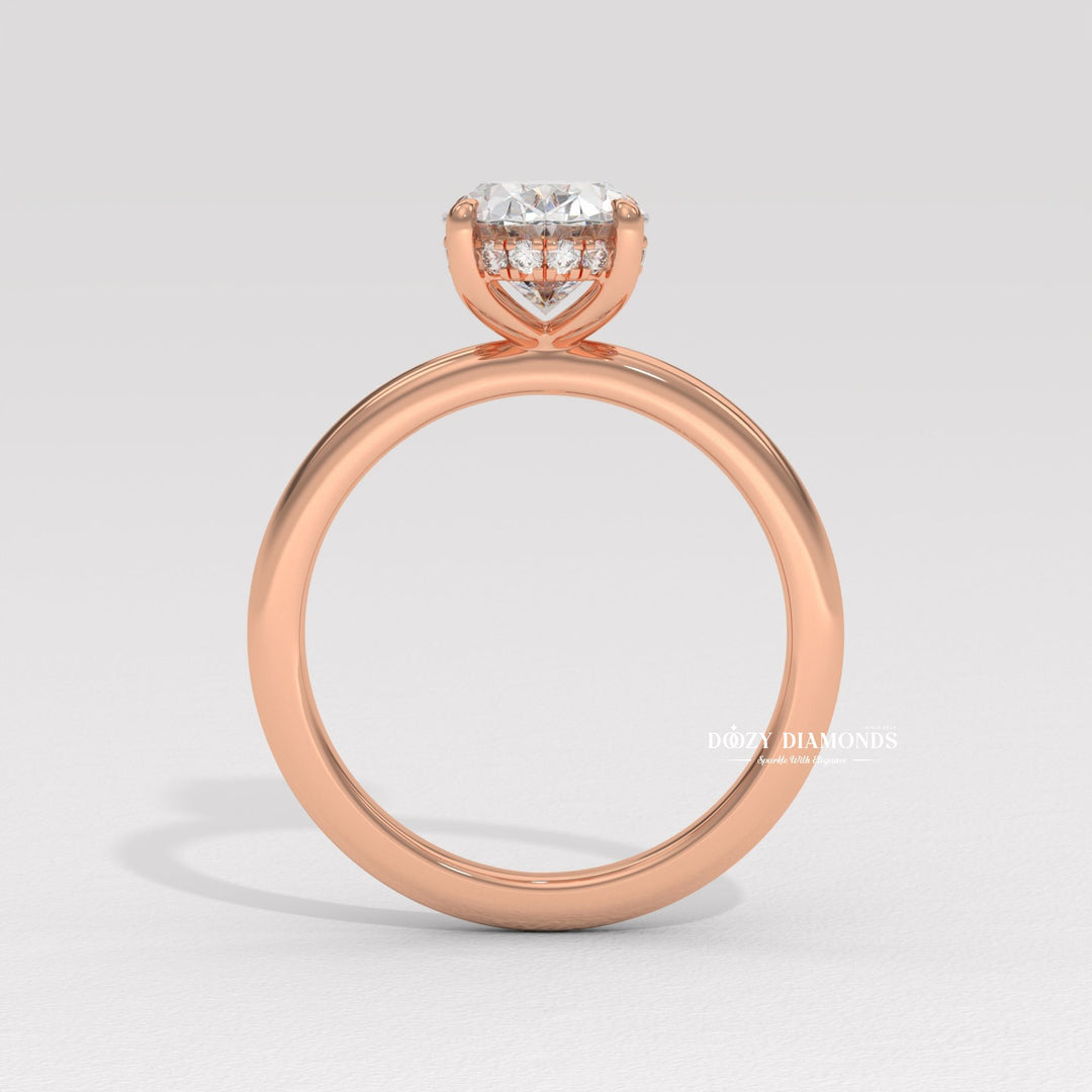 Side angle of oval hidden halo diamond engagement ring