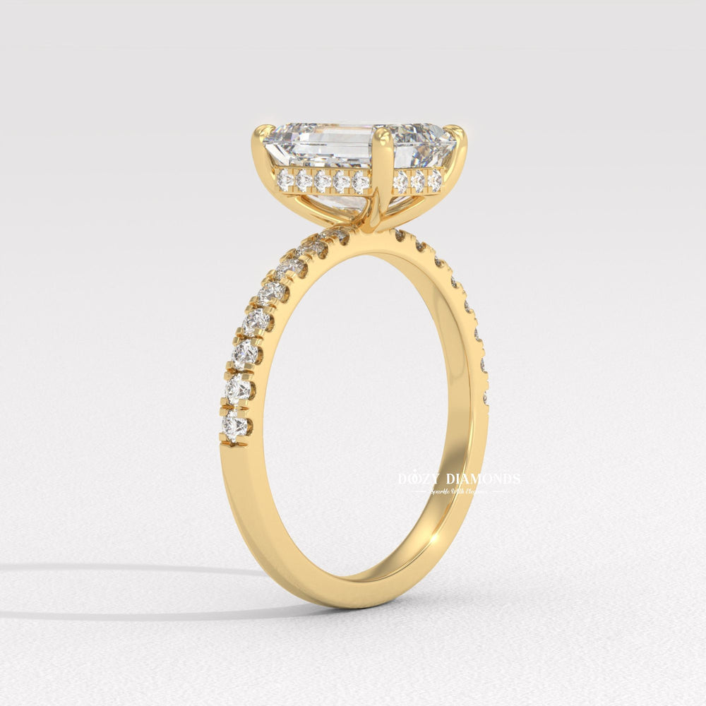 Emerald cut diamond ring worn on hand