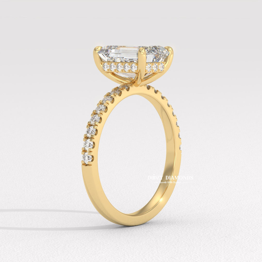 Emerald cut diamond ring worn on hand