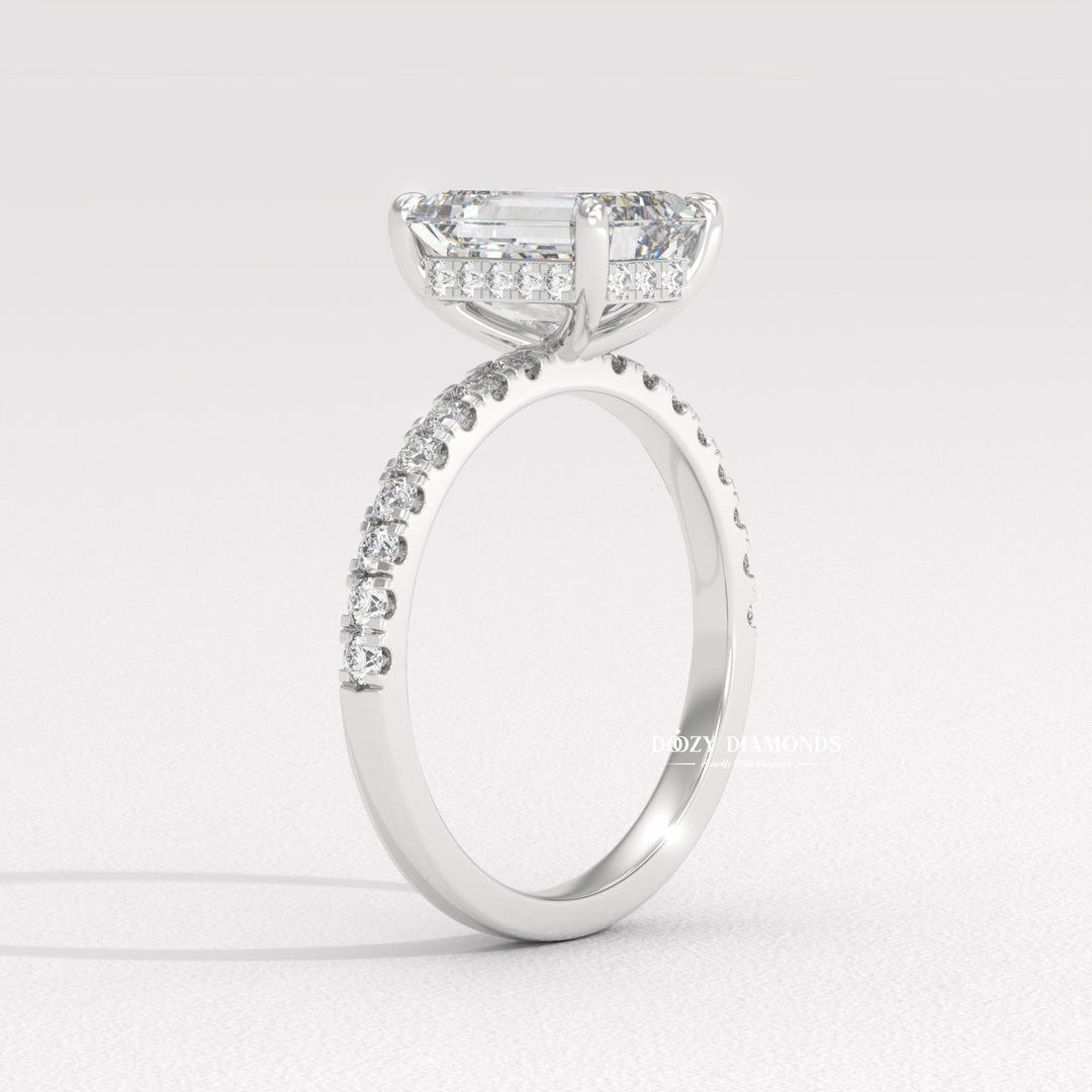 Emerald cut pave engagement ring with IGI certified center diamond