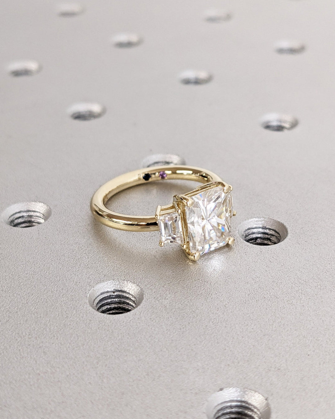 Lifestyle shot of radiant solitaire diamond ring on hand