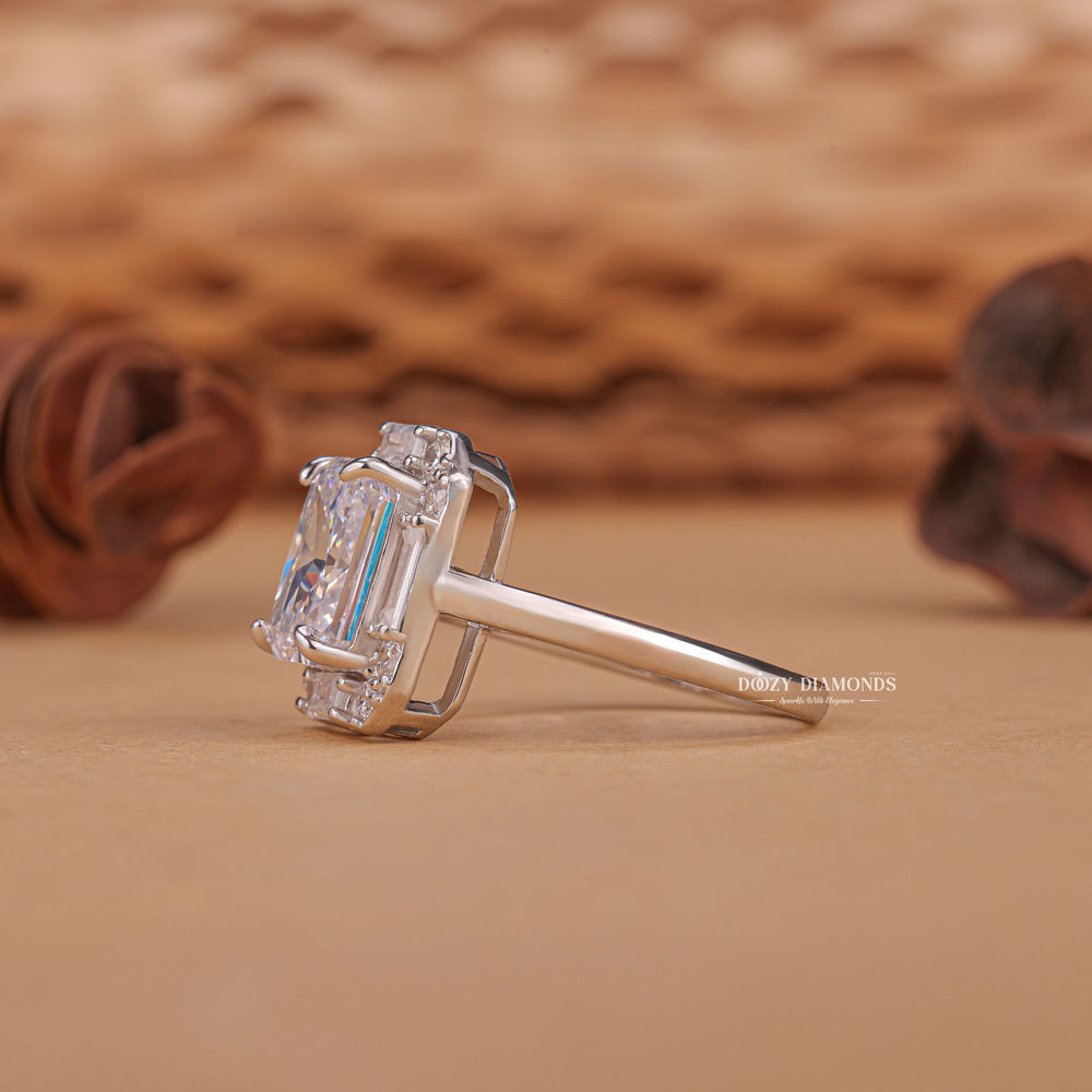 Radiant cluster diamond ring displayed on jewelry stand