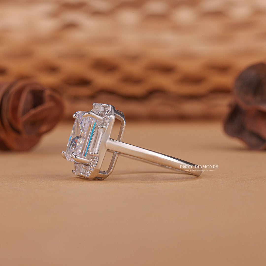Radiant cluster diamond ring displayed on jewelry stand