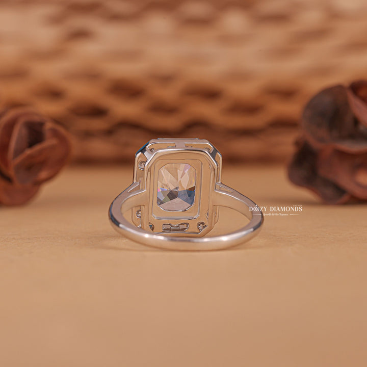 Angled view of radiant cut diamond in cluster setting