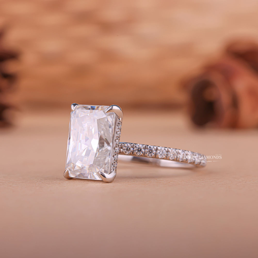 Radiant cut hidden halo engagement ring with IGI certified center diamond