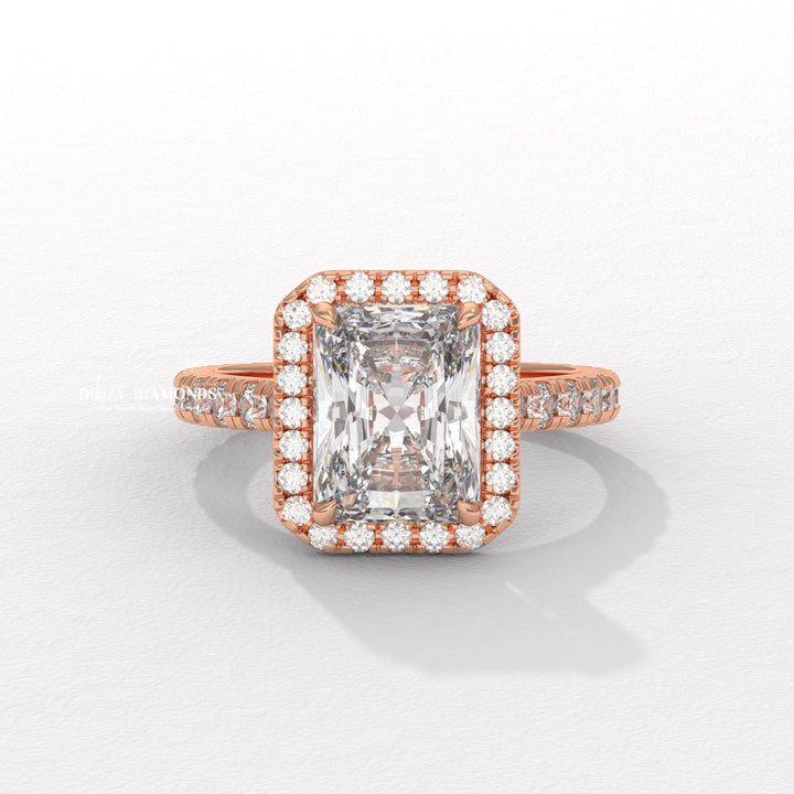 Radiant cut engagement ring shown with authenticity certificate