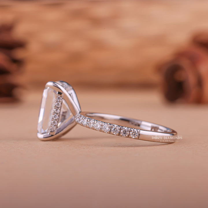 IGI certified radiant cut diamond in hidden halo engagement ring setting