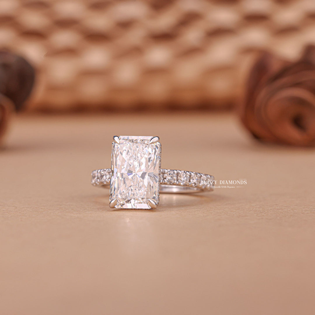 Unboxing view of radiant cut hidden halo diamond engagement ring