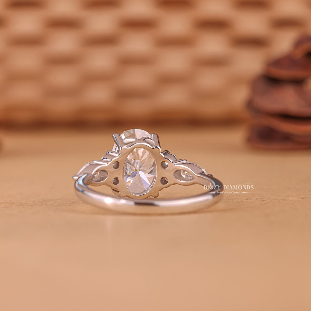 Oval cluster lab grown diamond ring fitted on finger