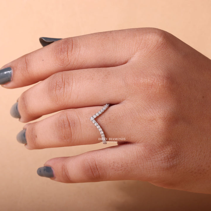 Round lab grown diamond band worn on hand
