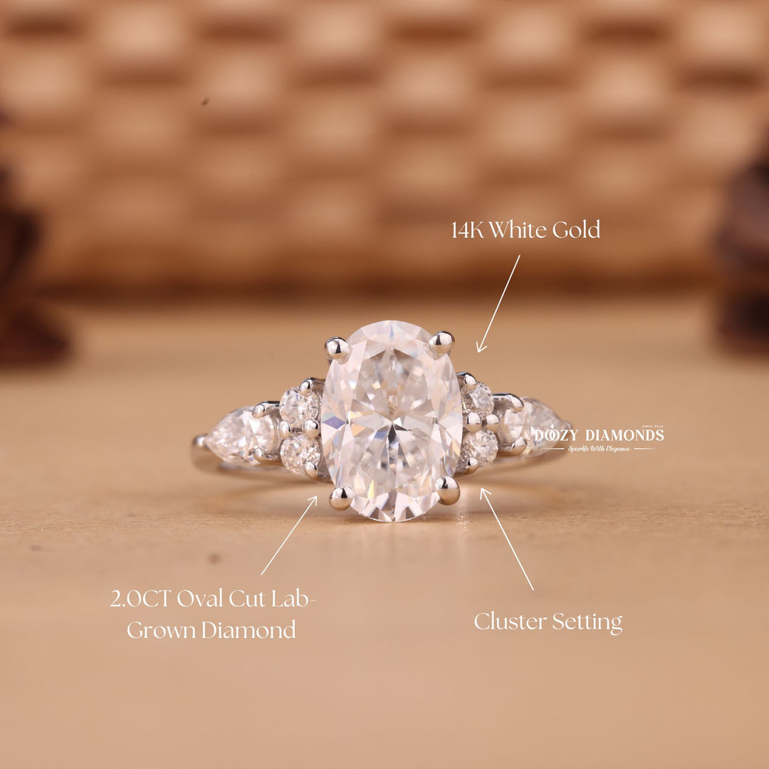Oval cluster ring set with an IGI graded diamond