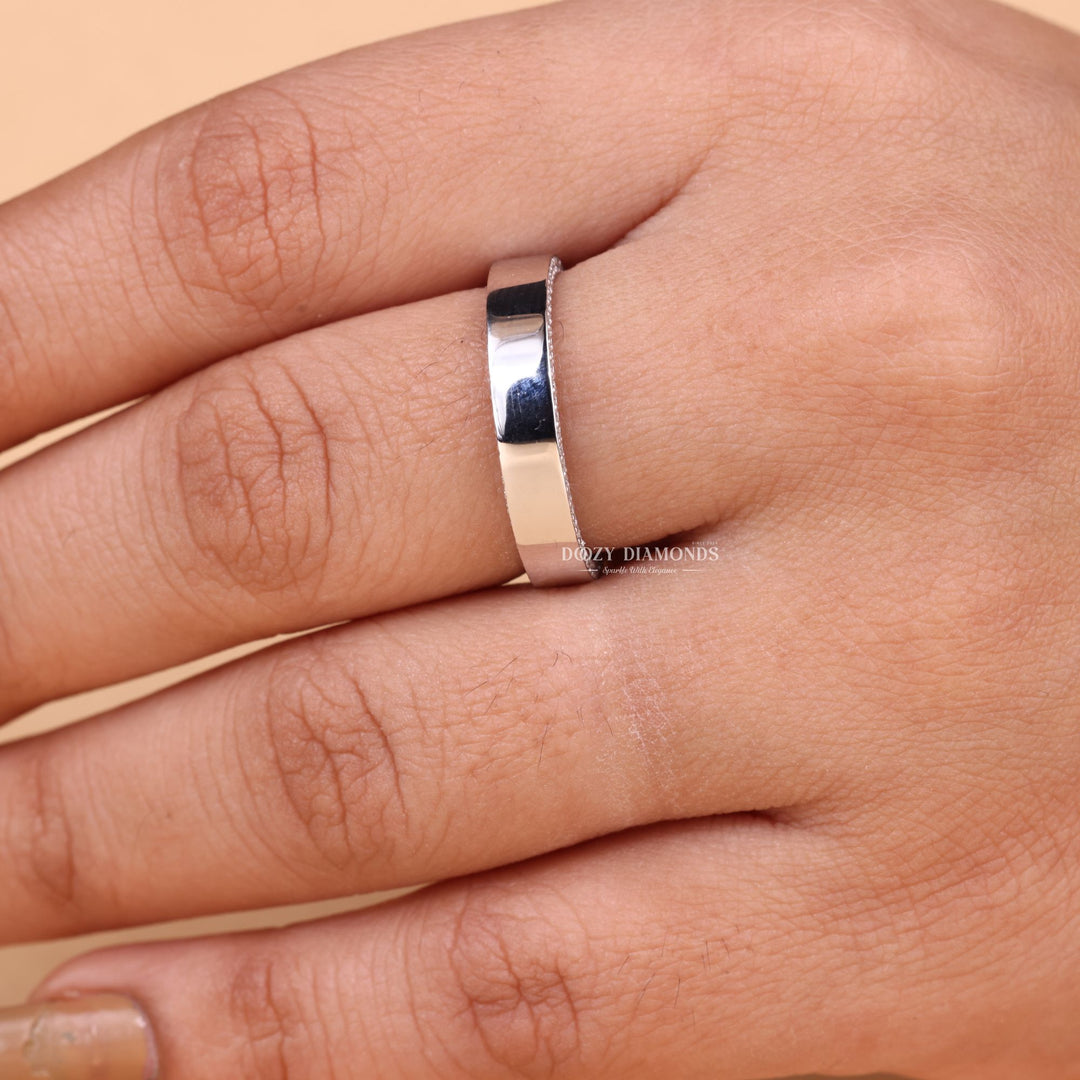 Round diamond wedding band in rose gold