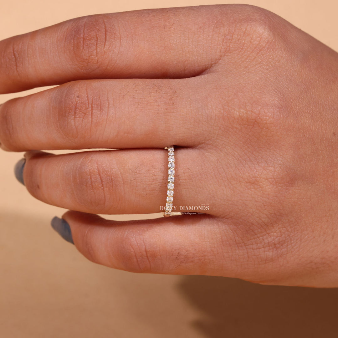 Side view of round diamond wedding band