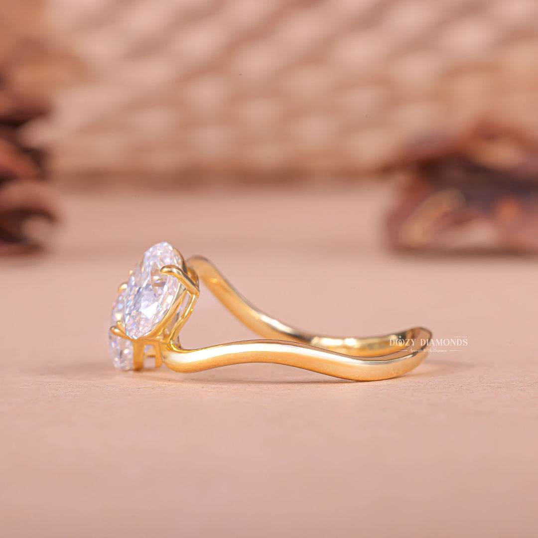 Oval cut engagement ring shown with authenticity certificate