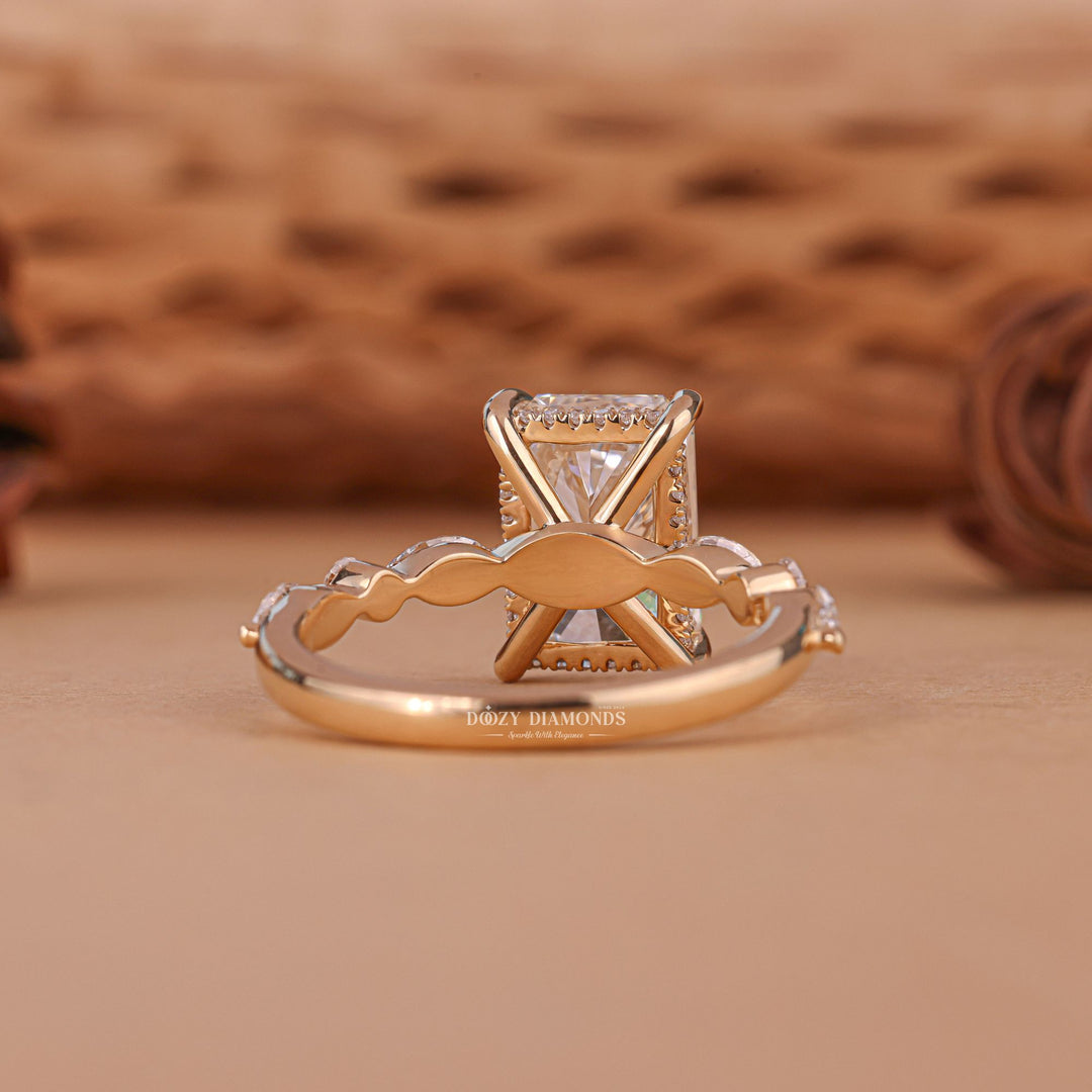 Radiant hidden halo engagement ring shown on hand for true-to-life sizing