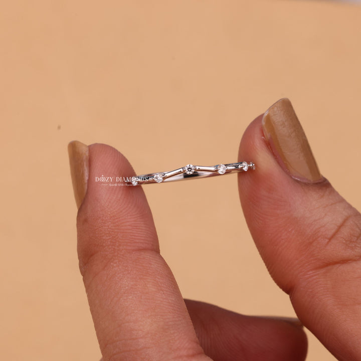 Side view of round diamond wedding band