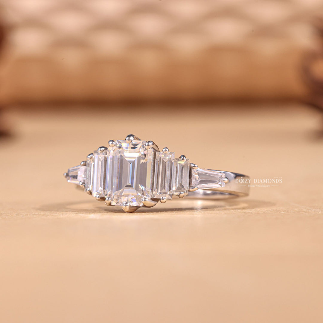 IGI certified emerald cut diamond in cluster engagement ring setting